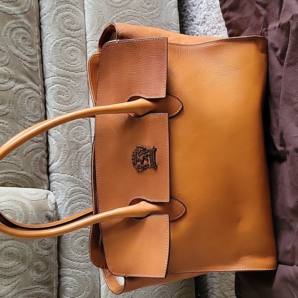 This Pratesi Firenze tan purse that has never been used. Italian